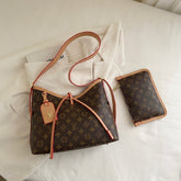 Sac à bandoulière à monogramme à lanières croisées