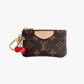 Sac bandoulière en ruban monogrammé