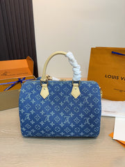 Sac fourre-tout et sac bandoulière en denim gaufré