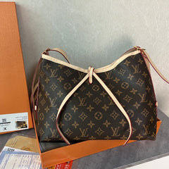 Sac bandoulière en ruban monogrammé